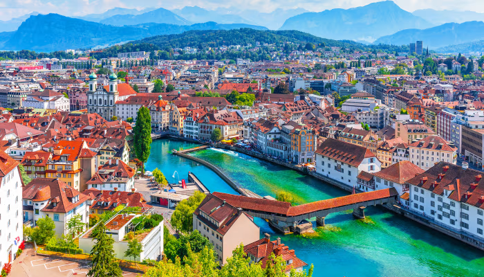 Switzerland travel places to visit with scenic Alps, lakes and charming villages