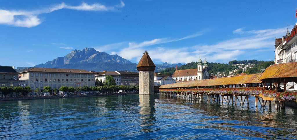 Switzerland travel places to visit with scenic Alps, lakes and charming villages